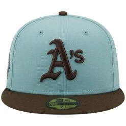 Men's Oakland Athletics New Era Light Blue/Brown 1973 World Series Beach Kiss 59FIFTY Fitted Hat -BigLeagueCaps Store brown oakland athletics 1973 world series beach kiss 59fifty fitted hat ss5 p 4997302pv 2u aib4ygzgbnnnunzmbeocv asbi8myfomwbwgfydjed